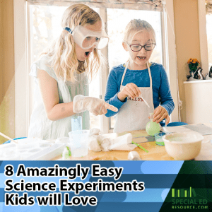 Two girls doing a science experiment at home in their kitchen.